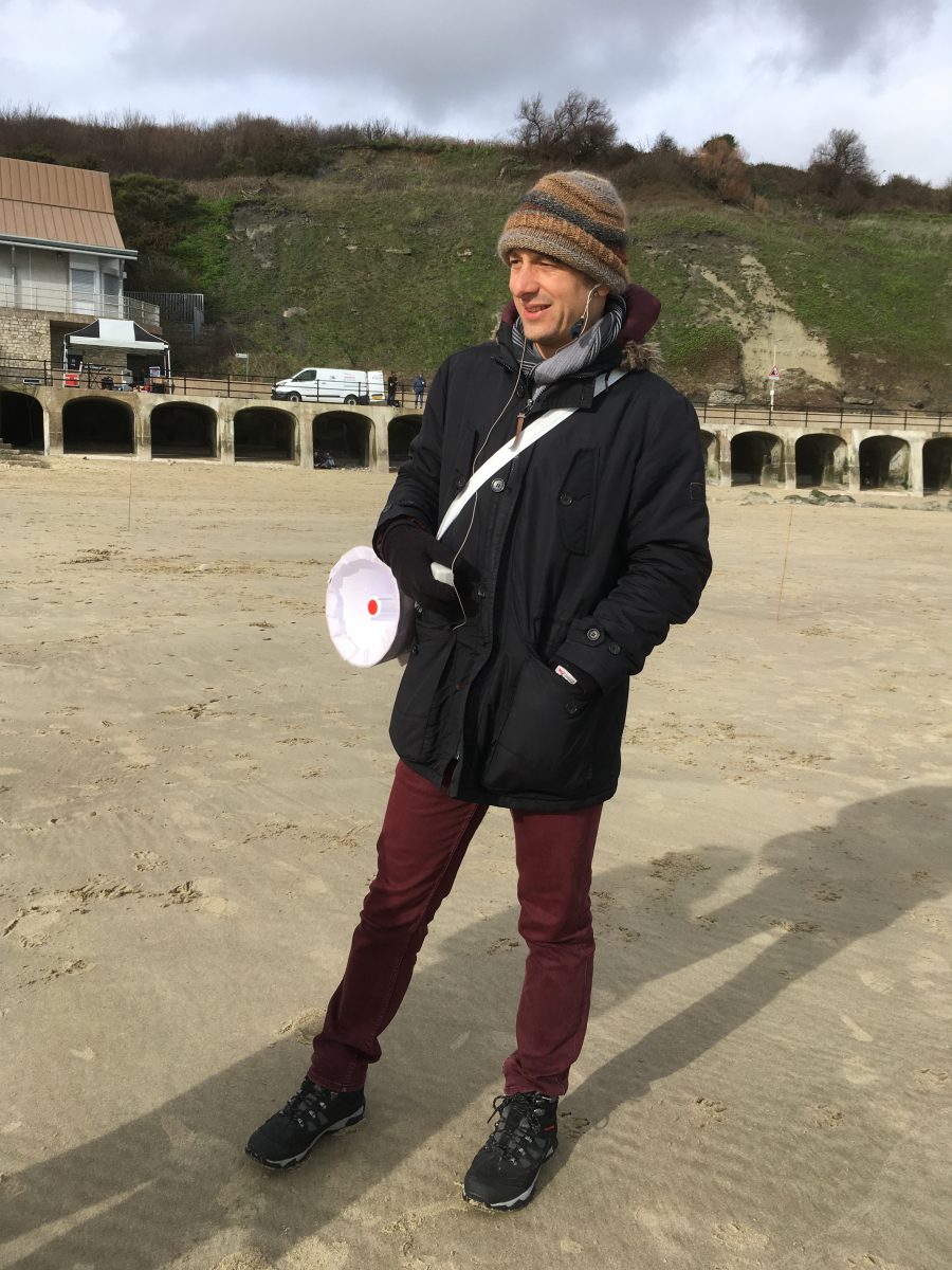 Singer Richard Navarro at the Beacons site test on Folkestone Sunny Sands Beach, February 2020.