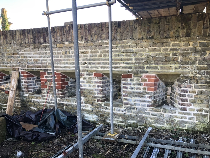 Gun loops on the Southeast wall, proposed installation site: Site visit, Dec 2019. Image by Joanna Jones.